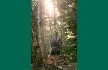 Bariatric surgery patient Krystal Kebler is shown on a hike in the woods.